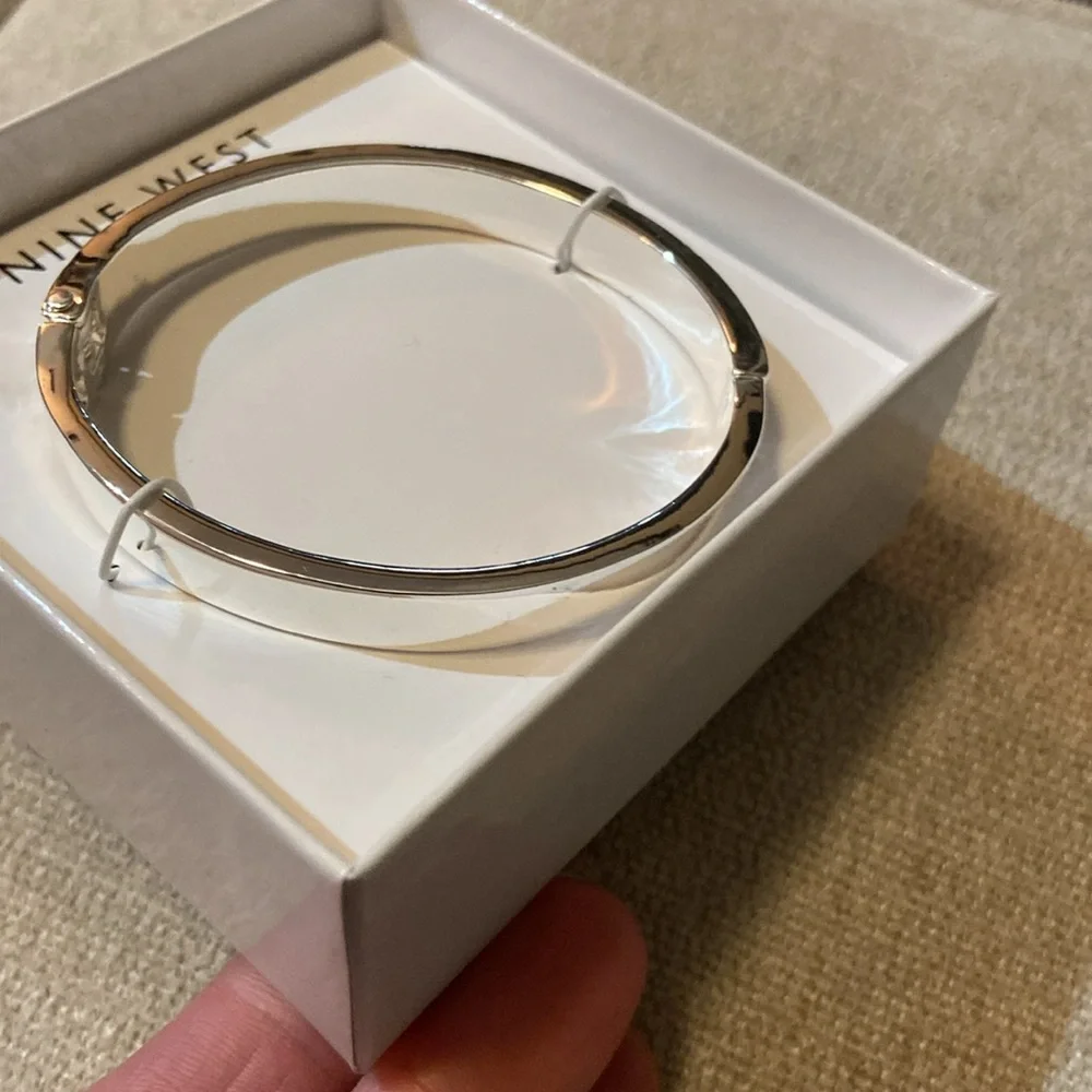 NWT/in box Nine West silver tone hinge bracelet with crystal baguette's. - Picture 6 of 7